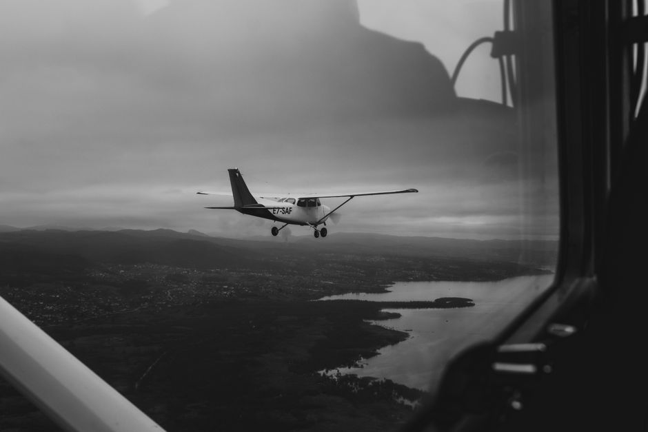 Female pilot flying a commercial aircraft