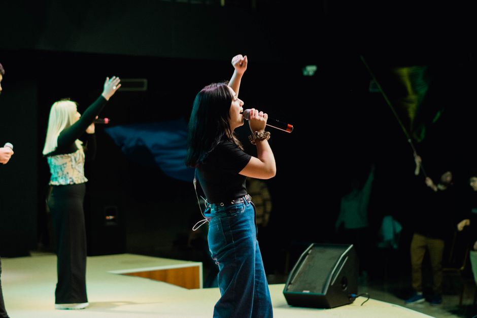 Afrobeats star Kizz Daniel performing on stage