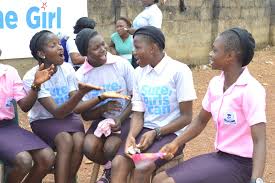 Nigerian students celebrating examination success in a modern classroom setting