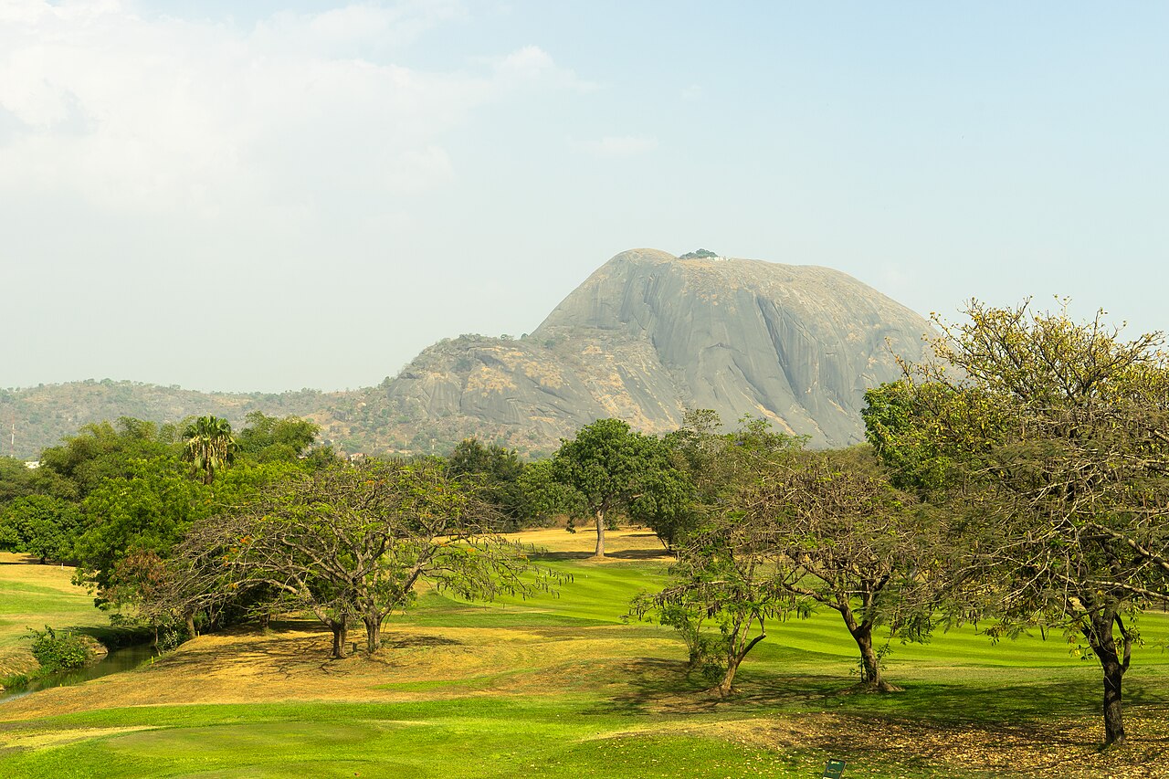 Professional golfers on a lush green course during the Nigeria Open Championship in Lagos
