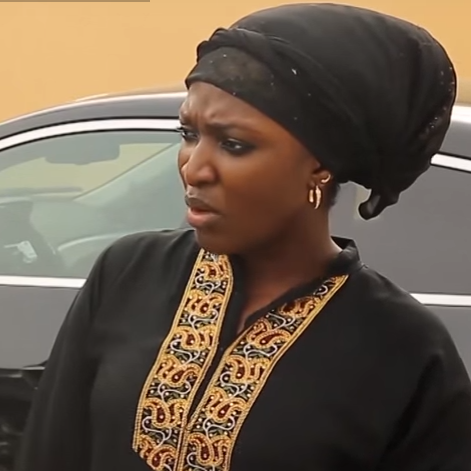 Toyin Abraham smiling during a Nollywood press event in Lagos