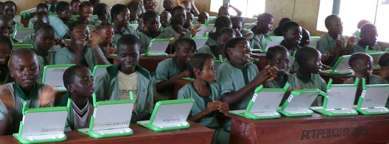 Students in a Nigerian classroom benefiting from improved educational facilities and government oversight.