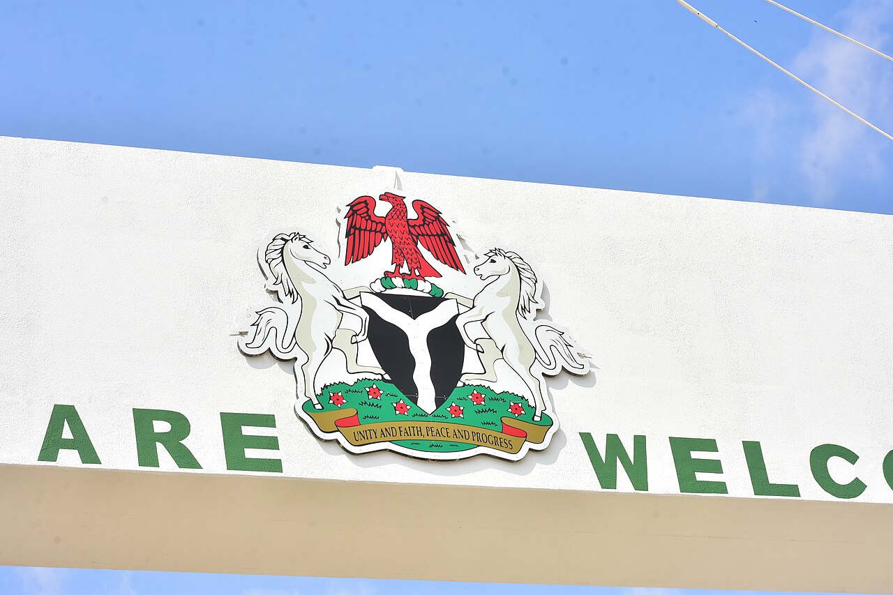 A symbolic gavel resting on a Nigerian legal document representing a court forfeiture ruling.