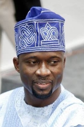 Nigerian Fuji icon performing live on stage with band members