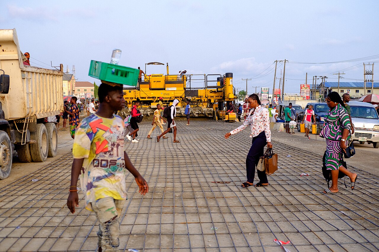 Excavators and construction workers at the Bisichi-Fan-Mangu Halle road project site in Plateau State