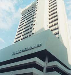 Traders and financial charts representing Nigeria on Bloomberg investable markets index
