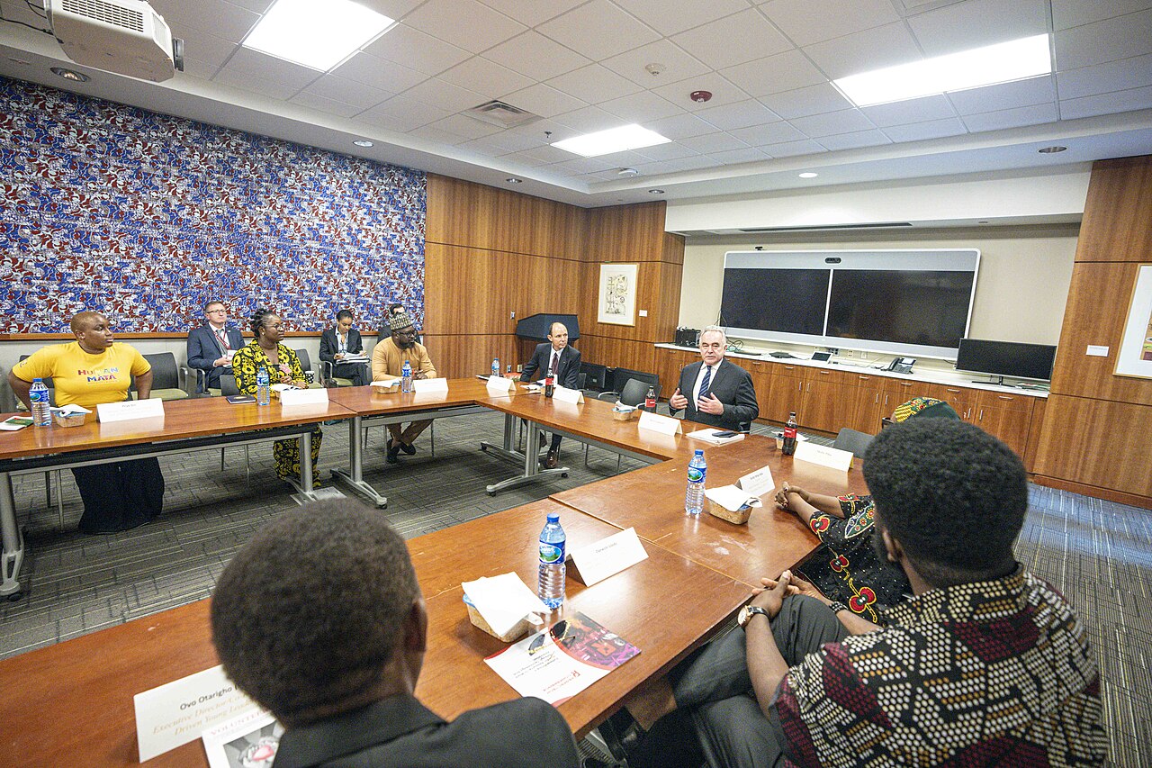 Nigerian and French flags displayed during a high-level diplomatic meeting in Abuja