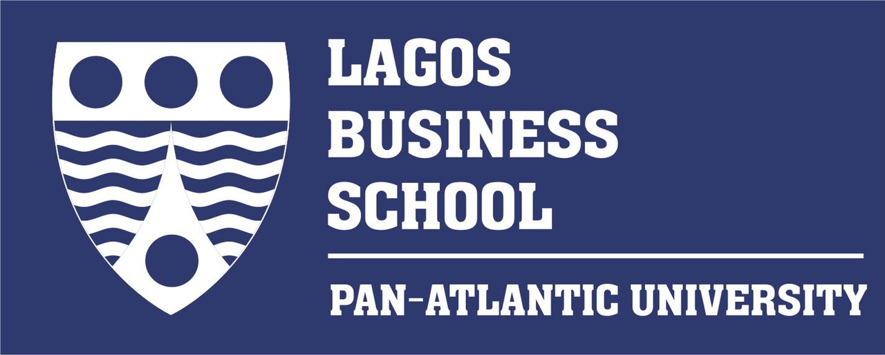 Business executives reviewing tax reform documents and e-invoicing software in Lagos