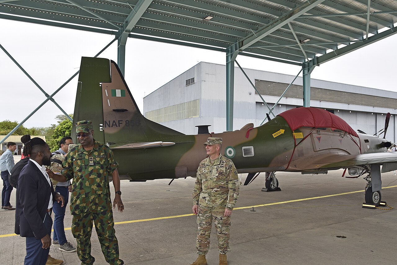 Nigerian Air Force aircraft and military personnel responding to an emergency